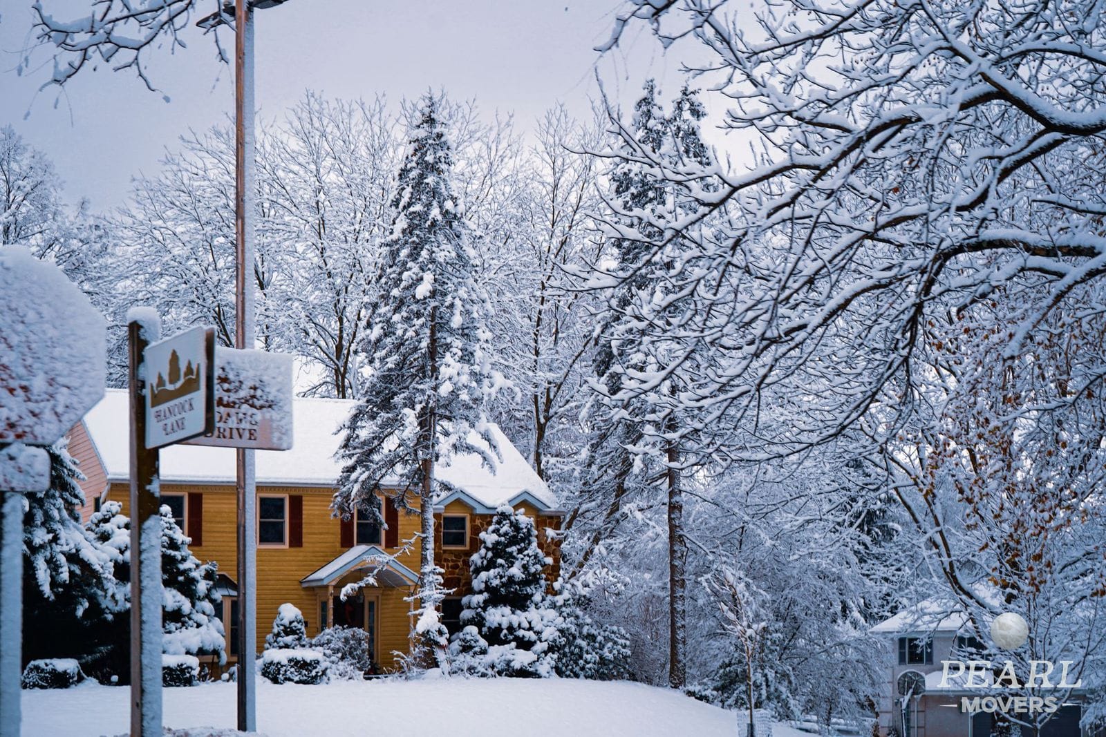 A snow-dusted residential street on a winter morning